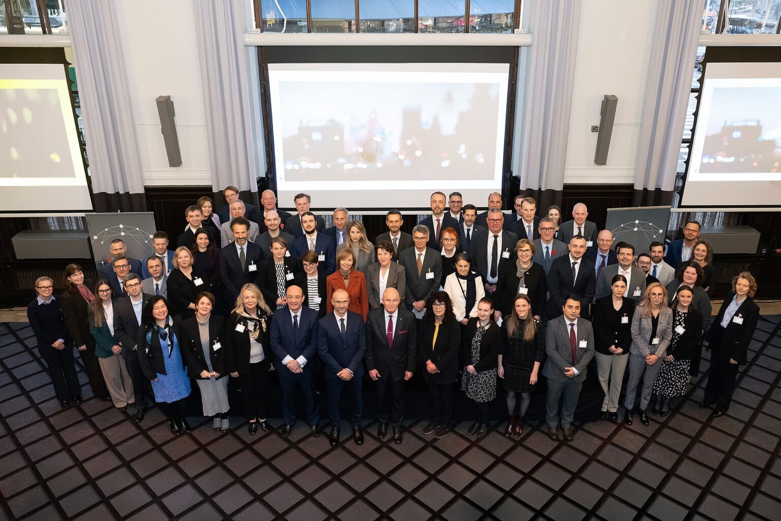 Group photo of some members of the Steering Board, Secretariat and national Points of Contacts.